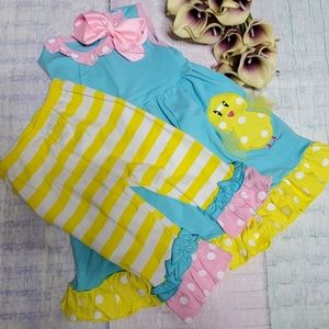 Sleeveless top, ruffle hem pants, and hair bow